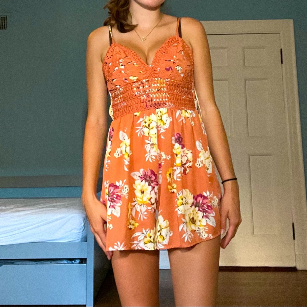 orange with flower printed romper
